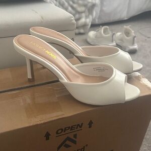 White kitten heels